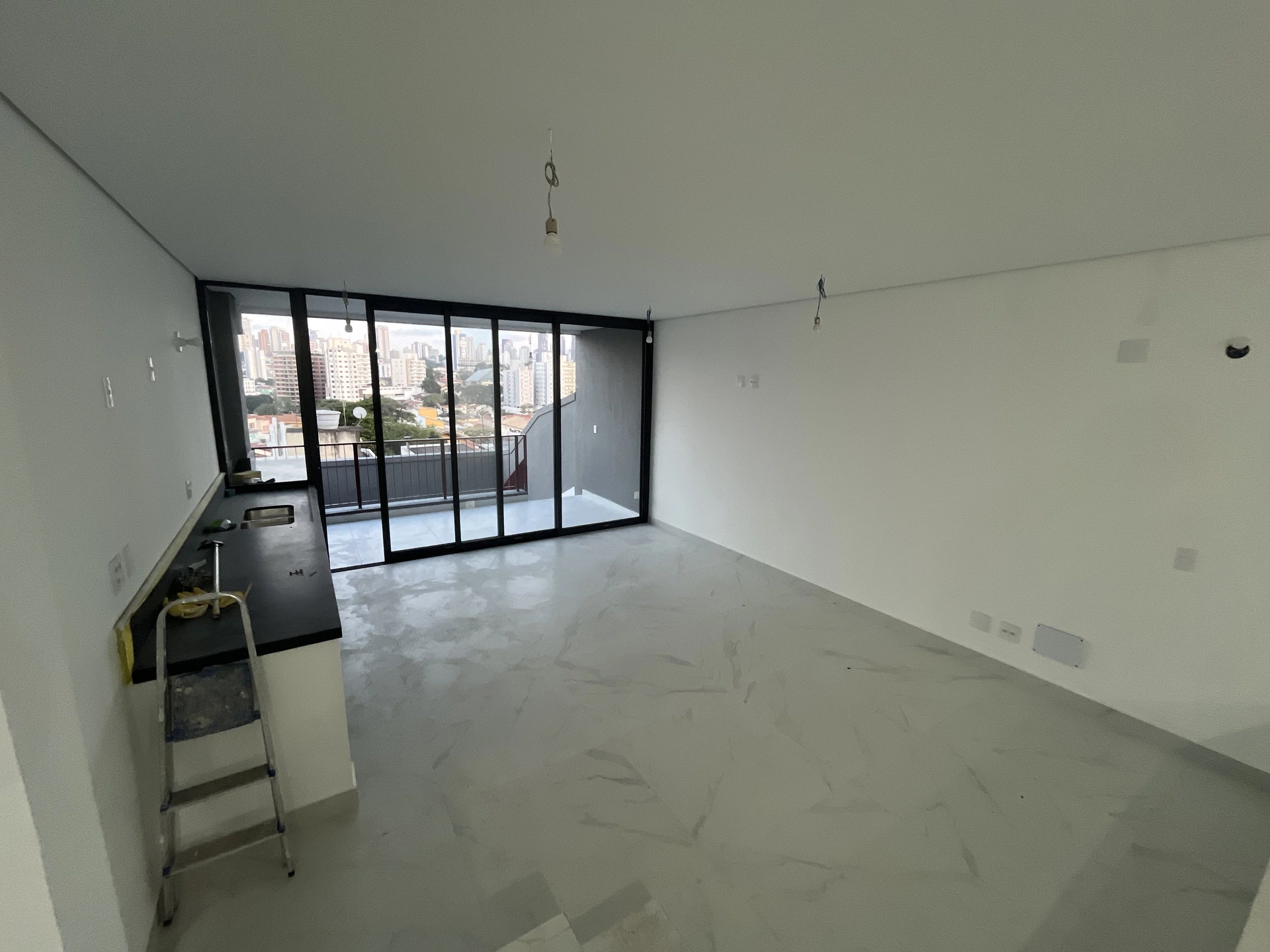 Sala e cozinha com abertura para a cidade Lapa SP