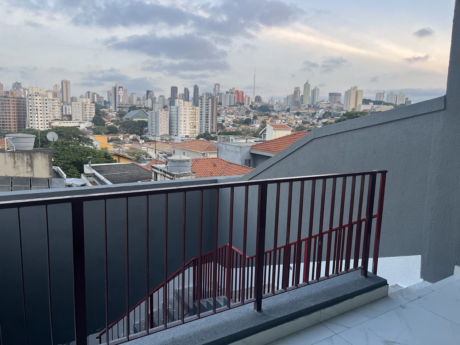 Terraço ao pôr do sol sobrado Lapa, São Paulo